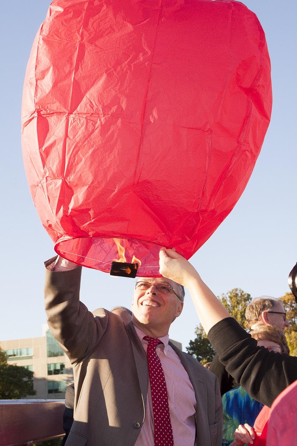 Chancellor Terry Allison with his lantern.  Preface photo/NATALIE MILLS 