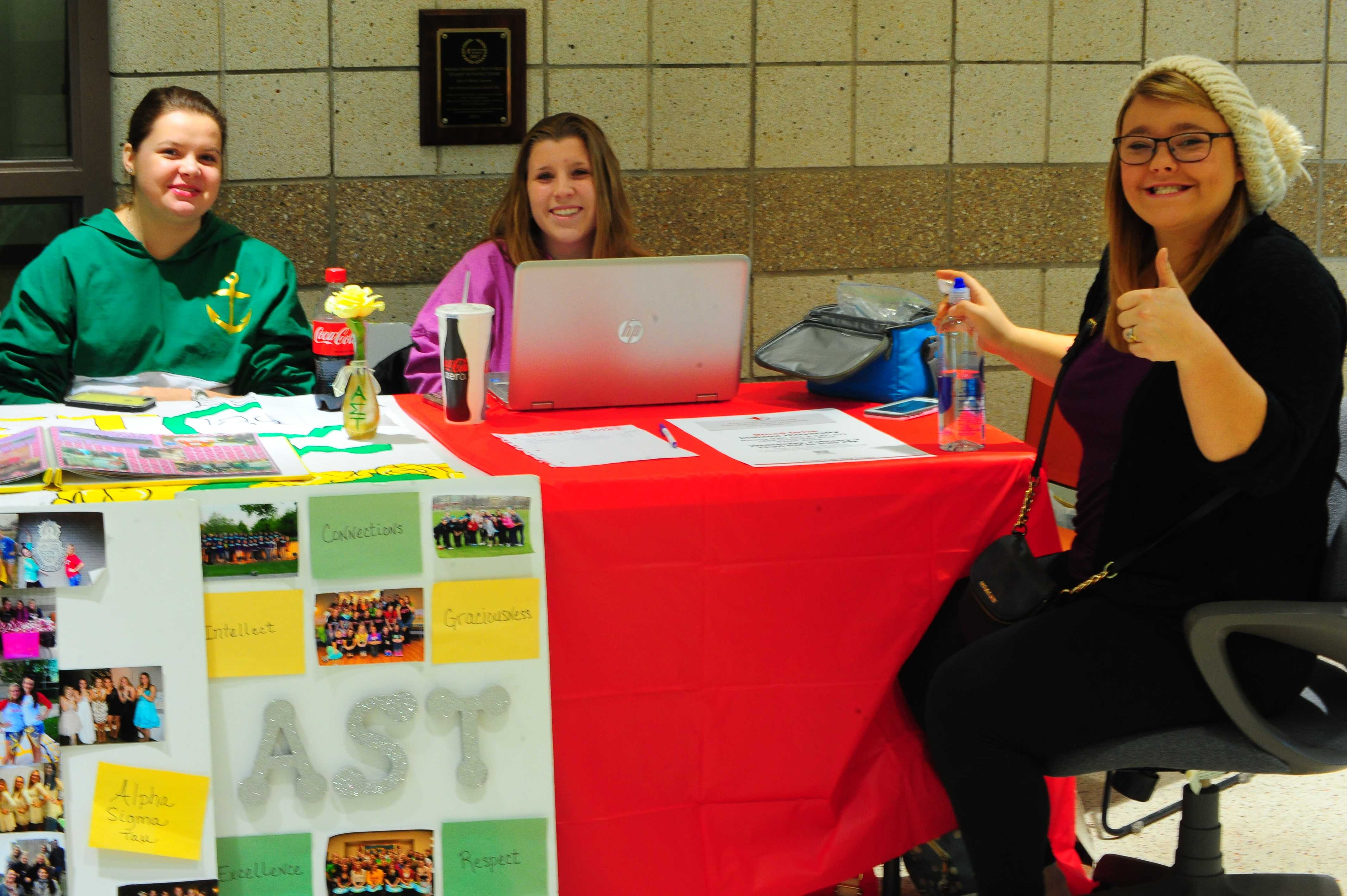 Alpha Sigma Tau sorority sets up table in Wiekamp to recruit new members. Photo Credit/Michael Montana