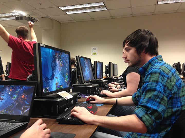 Nick Worsham (right) and Mike Moran (left) partake in a  League of Legends gaming session in Northside. (Preface photo/GEOFF LESAR)