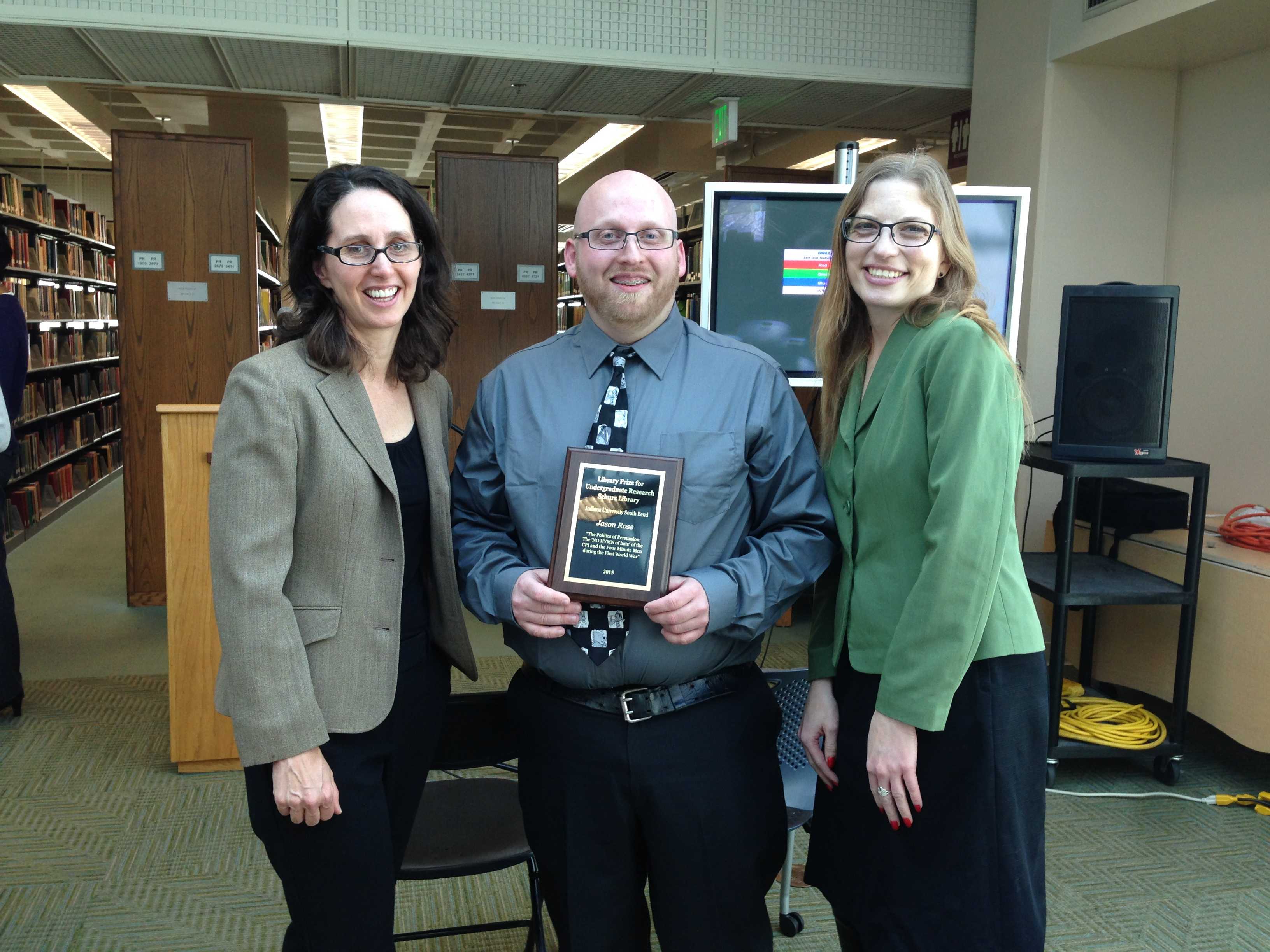 Pictured from left to right: Dr. Lisa Zwicker, Jason Rose, and Alison Stankrauff. Jason Rose wins the 2015 Library Prize. Preface photo/Kayla Smith
