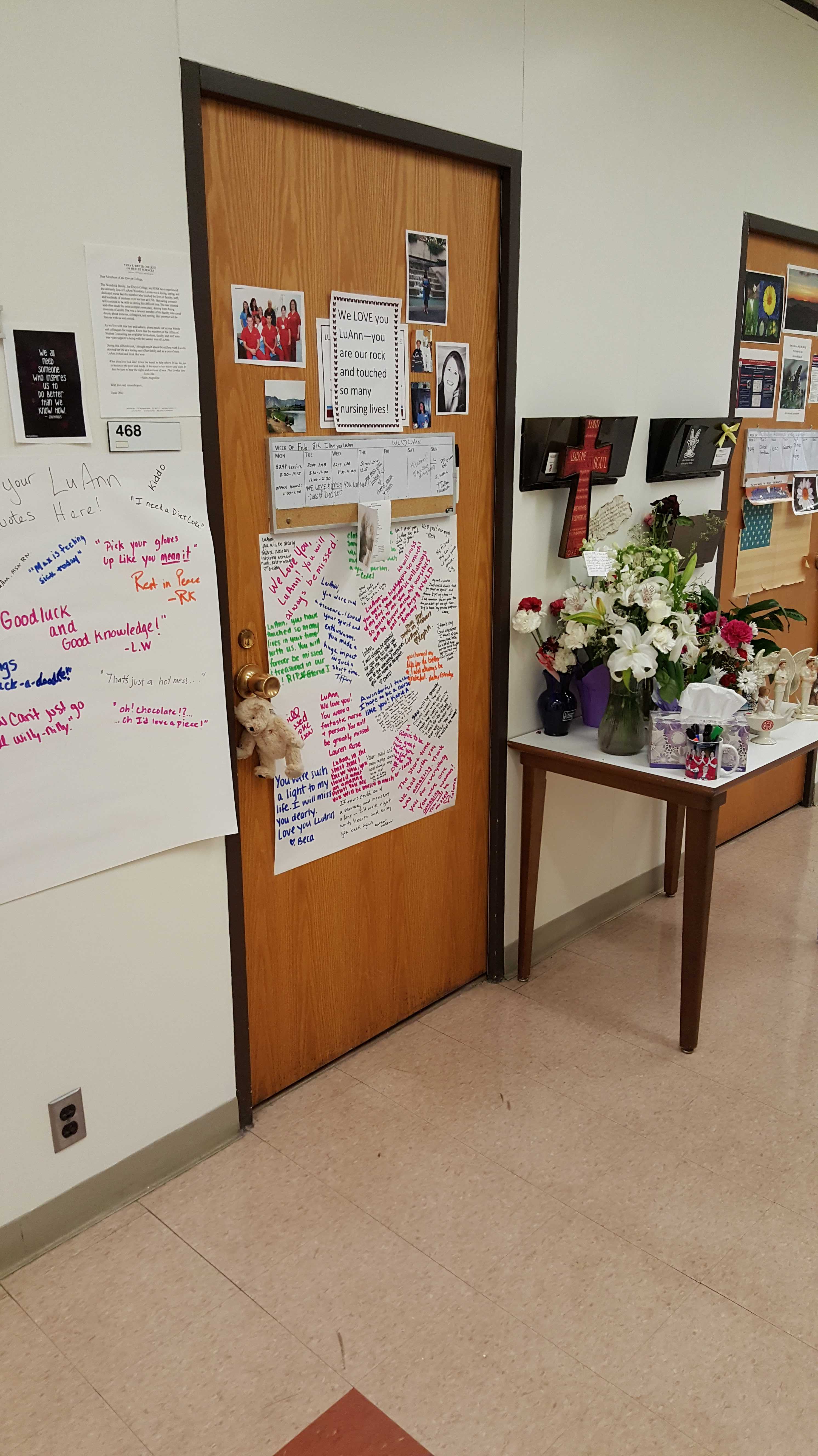 Faculty and students have turned the door to the late LuAnn Woodrick’s office in Northside Hall into a makeshift memorial.  Photo Credit/Jim Irizarry