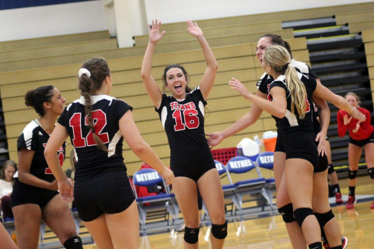 Titans celebrate after a long weekend led to an undefeated tournament and record setting accomplishments.
PHOTO/Casey McDonald