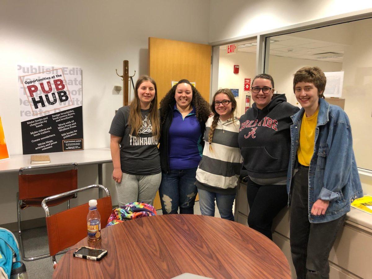 Club President Eva Monhaut and Treasuer, Tehya Henry hang out in the Pub Hub with fellow club members Cassandra Felten, Gina Massaro and Frankie Spring. PHOTO PROVIDED BY EVA MONHAUT